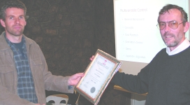 Kevin McElroy (right) presenting the SAIMC Patron Member certificate to Brian Thompson of Engen Refinery